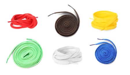 Set with different bright shoe laces on white background, top view. Banner design