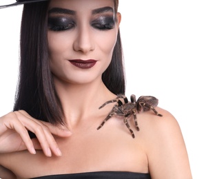 Mysterious witch with spider on white background, closeup