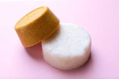Solid shampoo bars on pink background. Hair care