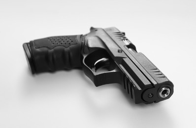 Standard handgun on white background. Semi-automatic pistol