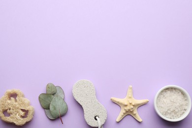 Flat lay composition with pumice stone on violet  background. Space for text