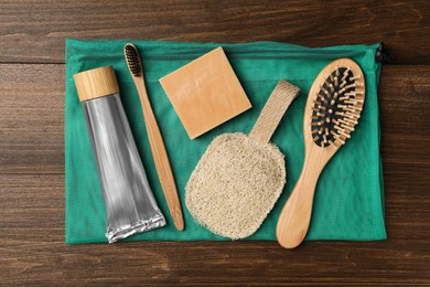 Flat lay composition with eco friendly products on wooden background. Conscious consumption