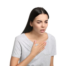 Young woman suffering from breathing problem on white background