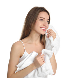 Young woman wiping face with towel on white background