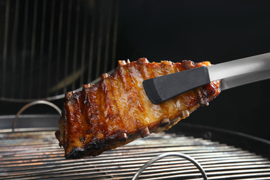 Delicious ribs on barbecue grill. Yummy meat