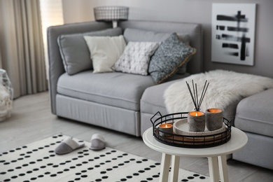 Photo of Cozy living room interior with big grey sofa