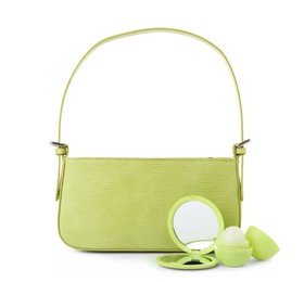 Stylish baguette bag with pocket mirror and lip balm isolated on white