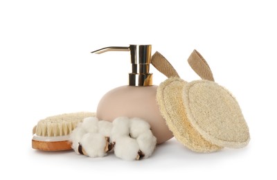 Set of toiletries with natural loofah sponges on white background