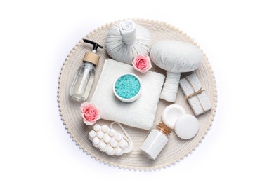 Beautiful spa composition with herbal massage bags and different care products on white background, top view