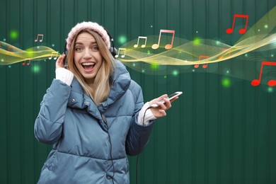 Image of Happy woman listening to music near green wall. Music notes illustrations flowing from headphones
