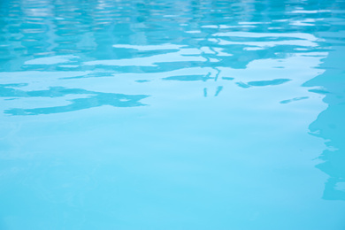 Clear water in swimming pool as background, closeup