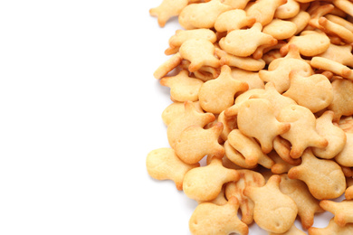 Delicious crispy goldfish crackers on white background, closeup