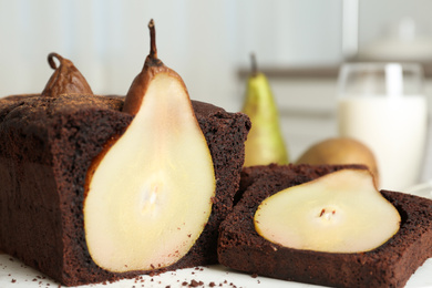 Tasty pear bread on table, closeup. Homemade cake