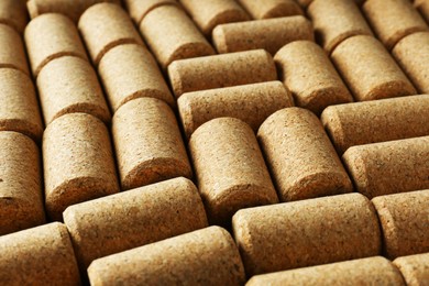 Many corks of wine bottles as background, closeup