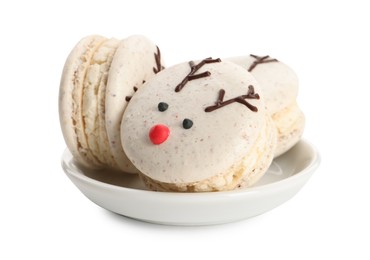 Photo of Tasty reindeer Christmas macarons on white background
