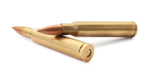 Photo of Two bullets on white background. Military ammunition