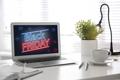 Black Friday announcement on laptop screen. Online shopping