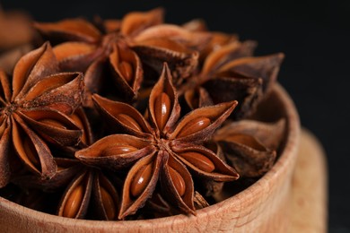 Aromatic anise stars in bowl, closeup view