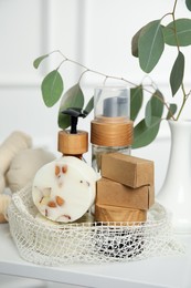 Eco friendly personal care products on white table indoors
