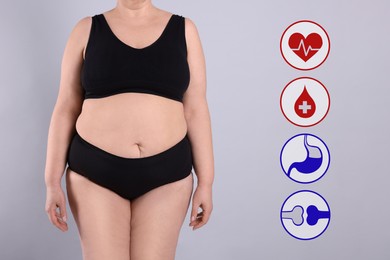 Image of Virtual icons demonstrating different health problems and overweight woman on grey background, closeup