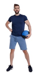 Athletic man with medicine ball isolated on white