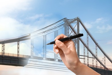 Image of Woman drawing picture of bridge, closeup. Business cooperation concept