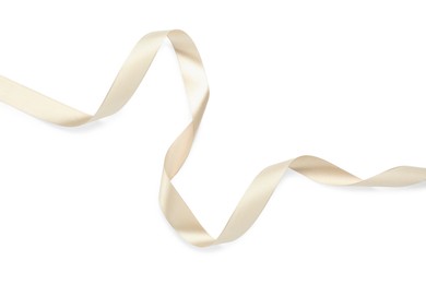Beautiful beige ribbon isolated on white, top view