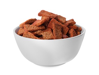 Crispy rusks with seasoning in bowl isolated on white