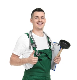 Young plumber with force cup and clipboard on white background