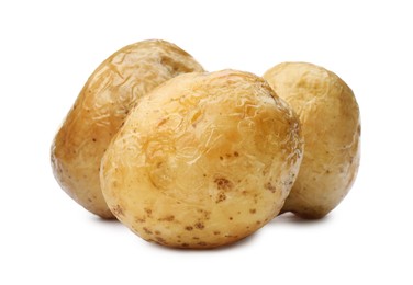 Tasty whole baked potatoes on white background
