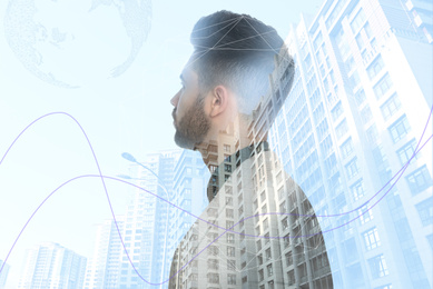 Double exposure of young businessman and cityscape. Financial analytics