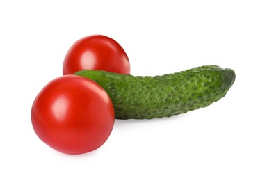 Photo of Cucumber and tomatoes symbolizing male genitals on white background. Potency concept