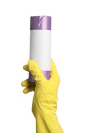 Photo of Person in rubber glove holding roll of violet garbage bags on white background, closeup. Cleaning supplies