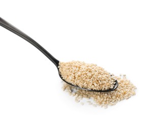 Spoon with sesame seeds on white background