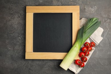 Blank chalkboard and fresh vegetables on grey table, flat lay with space for text. Cooking Classes