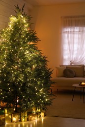 Photo of Stylish living room interior with beautiful Christmas tree