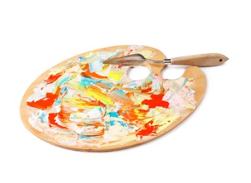 Dirty wooden artist's palette with painting knife isolated on white