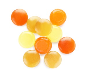 Many different color cough drops on white background, top view