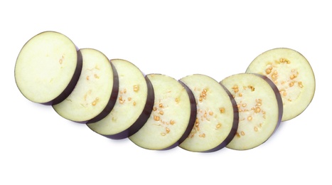 Slices of ripe eggplant isolated on white, top view