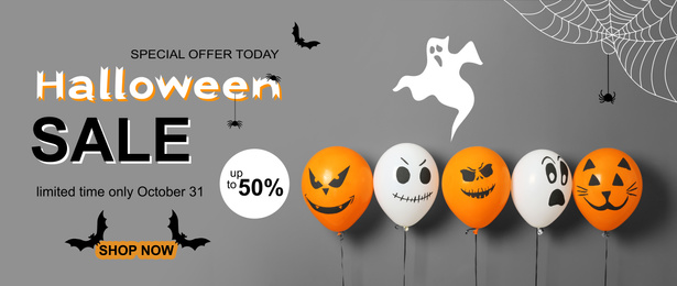 Image of Halloween sale banner with balloons on grey background