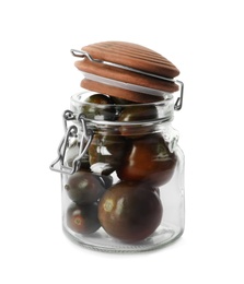 Pickling jar with fresh tomatoes on white background
