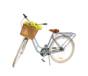 Retro bicycle with wicker basket on white background