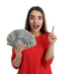 Emotional young woman with money on white background