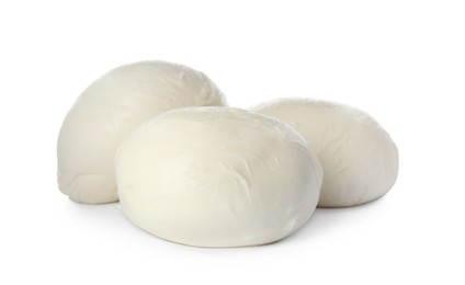 Delicious mozzarella cheese balls on white background