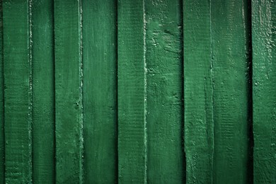 Photo of Texture of green wooden wall as background, closeup