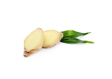 Photo of Slices of fresh ginger and leaves isolated on white