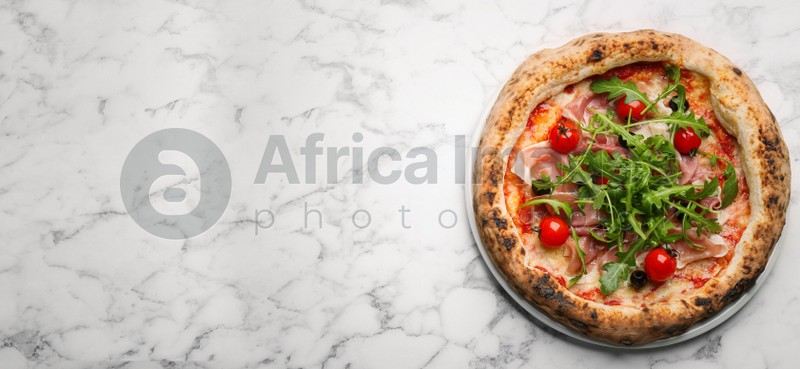 Tasty pizza with meat and arugula on white marble table, top view with space for text. Banner design