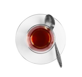 Glass of traditional Turkish tea with spoon isolated on white, top view