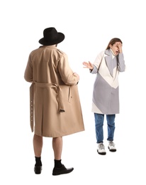 Photo of Exhibitionist exposing naked body under coat in front of young woman isolated on white