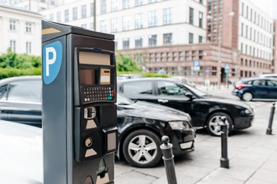 Photo of Modern parking meter on city street, space for text